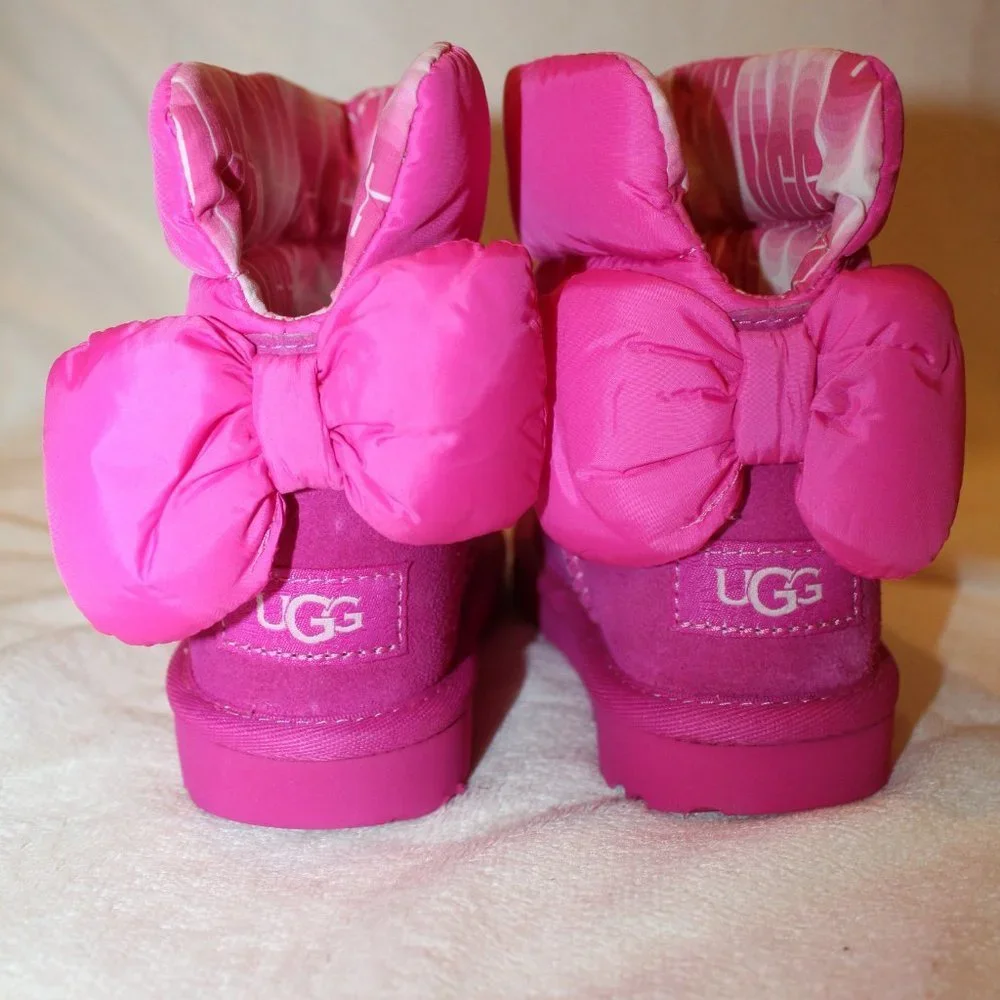 NIB UGG BAILEY BOW SUEDE PUFFER SHEARLING‎ LINGED WINTER SNOW BOOTS PINK